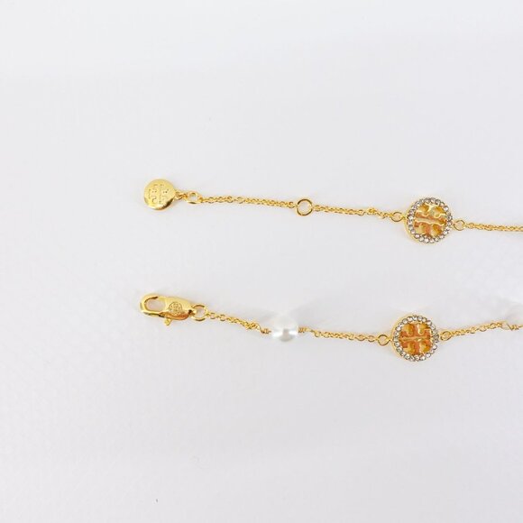 Tory Burch Crystal Logo & Imitation Pearl Station Bracelet Ivory/Tory Gold OS - Picture 7 of 16